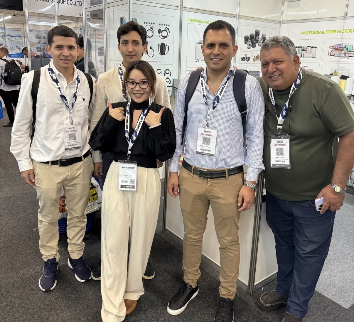 Yuwuzhi team pictured with international business contacts at an industry exhibition